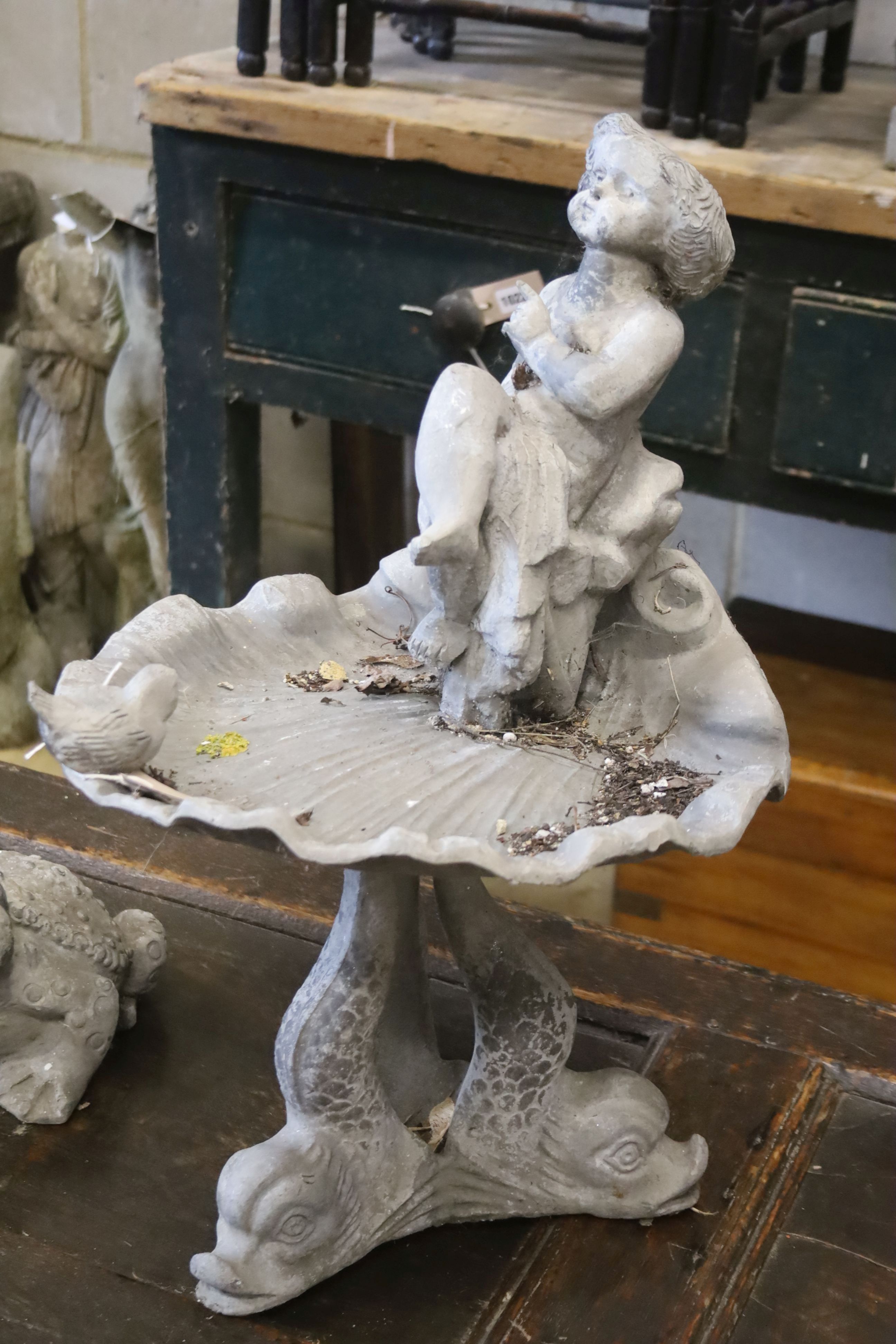 A cast lead scallop shell and figural bird bath, height 60cm, together with a cast lead frog garden ornament